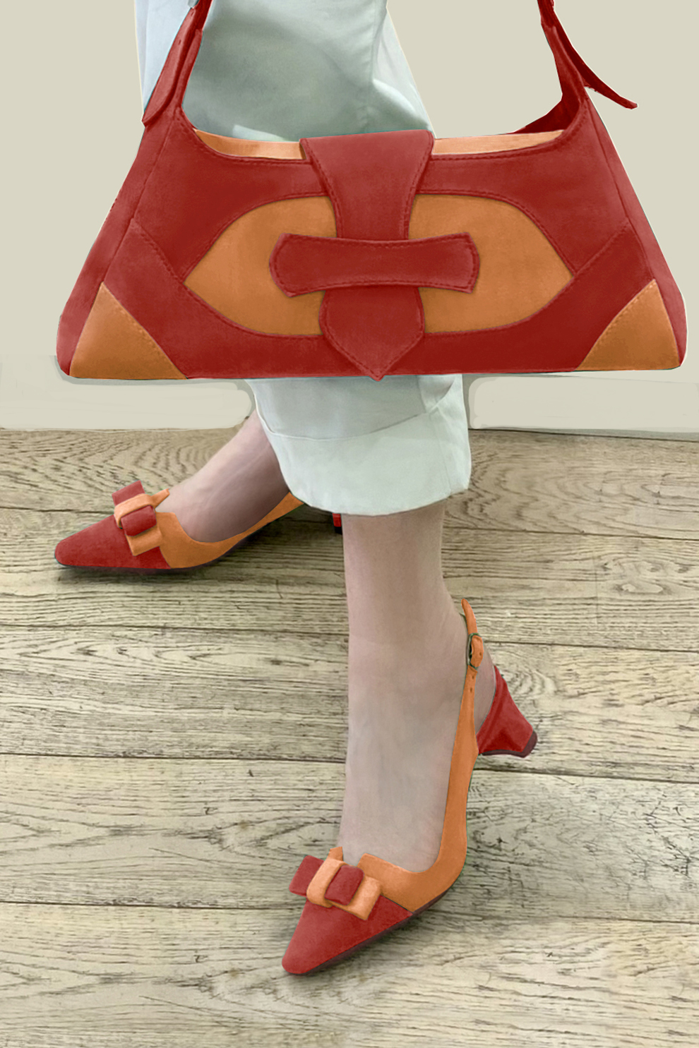 Dress handbag in scarlet red and apricot orange leather - Worn view